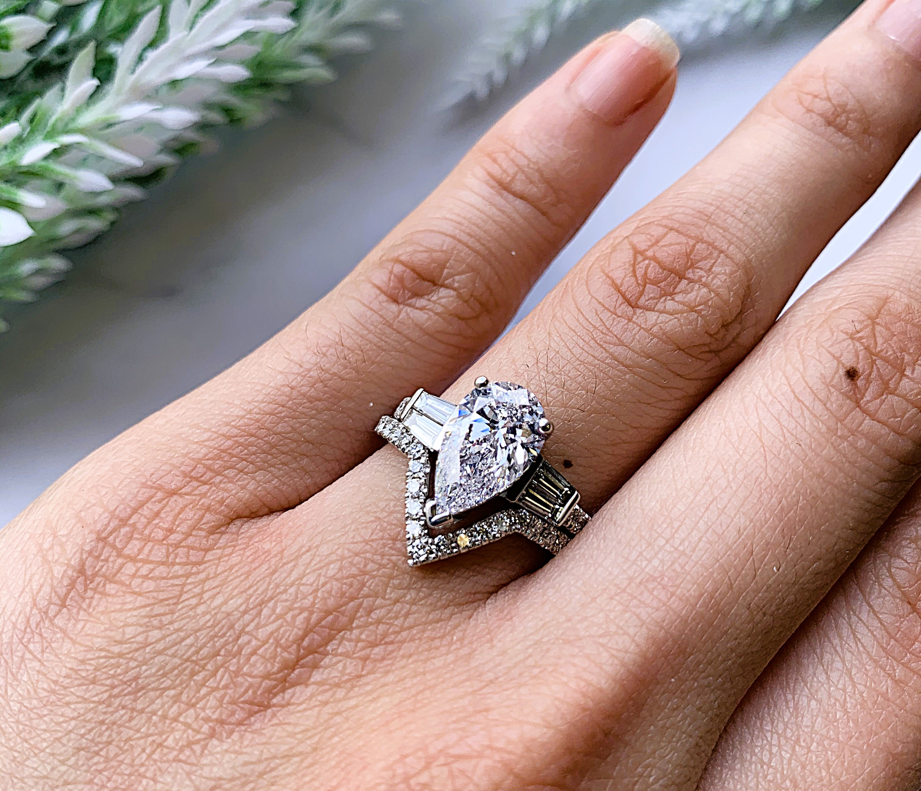 Pear Shape with Round and Baguette Side Diamonds